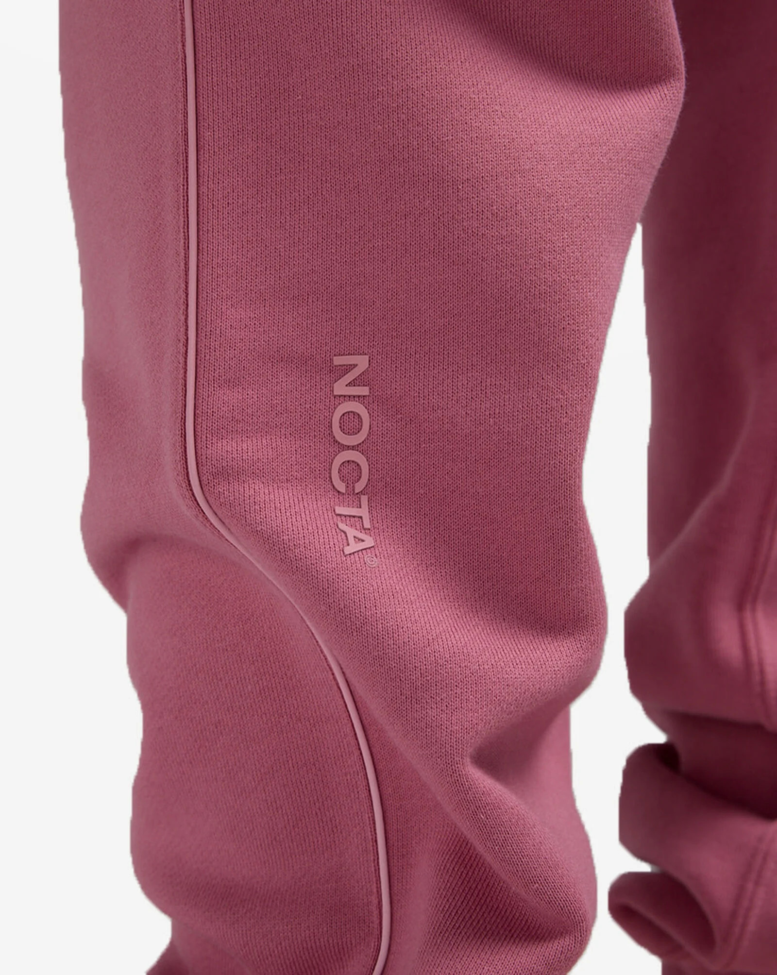 Штани Nike x NOCTA Northstar Nylon Track Pant Desert Berry FN7661-667