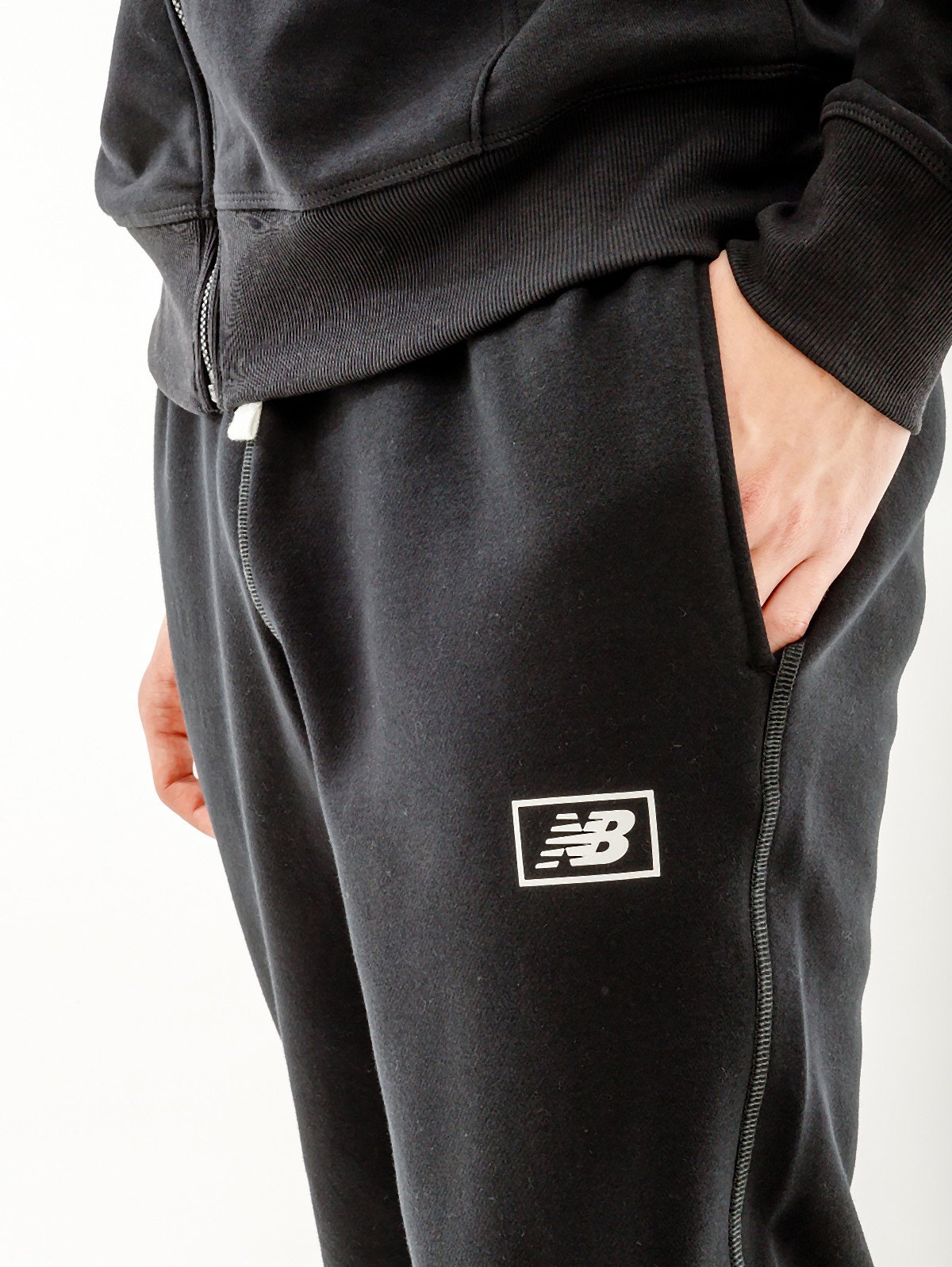 Штани New Balance Essentials Brushed MP33521BK