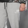 Брюки New Balance NB ESSENTIALS STACKED LOGO MP03558AG