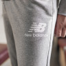 Брюки New Balance NB ESSENTIALS STACKED LOGO MP03558AG