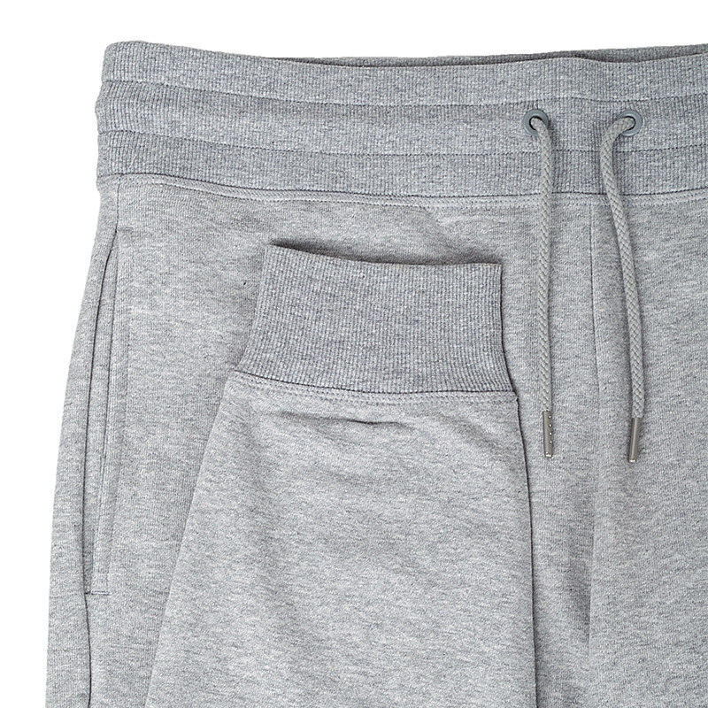 Брюки New Balance NB ESSENTIALS STACKED LOGO MP03558AG