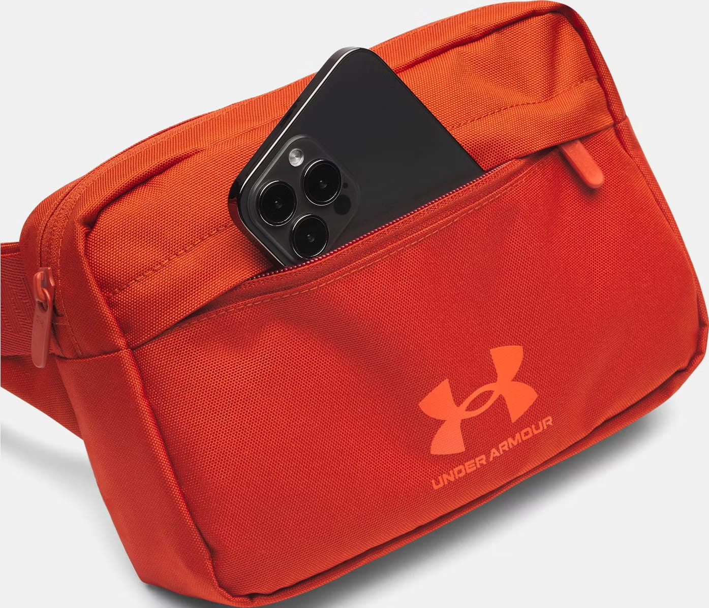 Сумка на пояс Under Armour Essential Lite WB Xbody 2L помаранчевий 15,3 x 24 x 10,5 см (1381914-842) 1381914-842