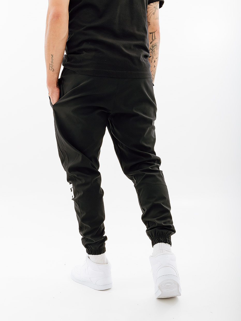 Штани Nike M NK DNA WOVEN PANT SSNL DX3565-010