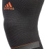 Фіксатор коліна Adidas Performance Knee Support чорний, червоний Уні S ADSU-13321RD