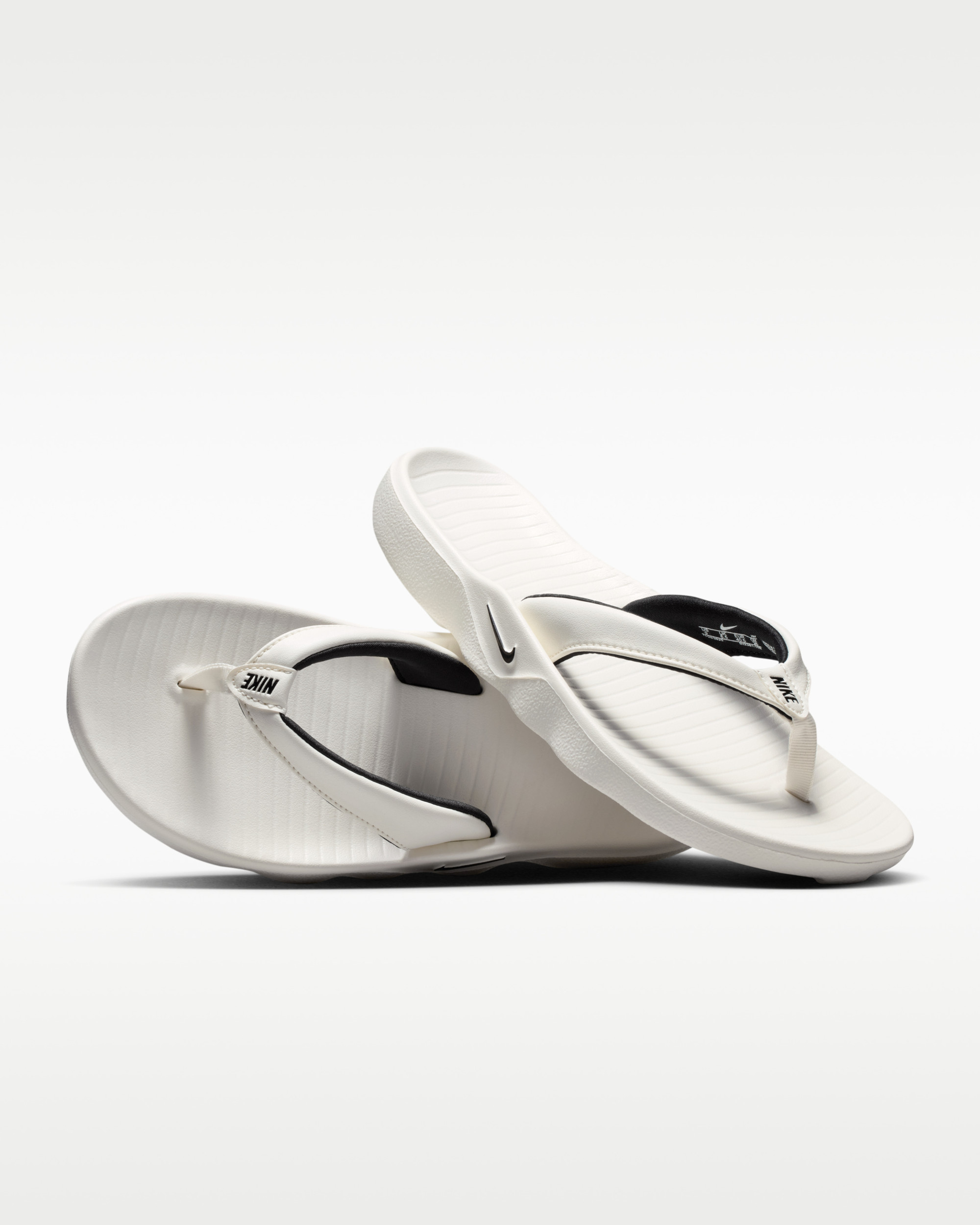 Шльопанці Nike W MARINA IH2381-100