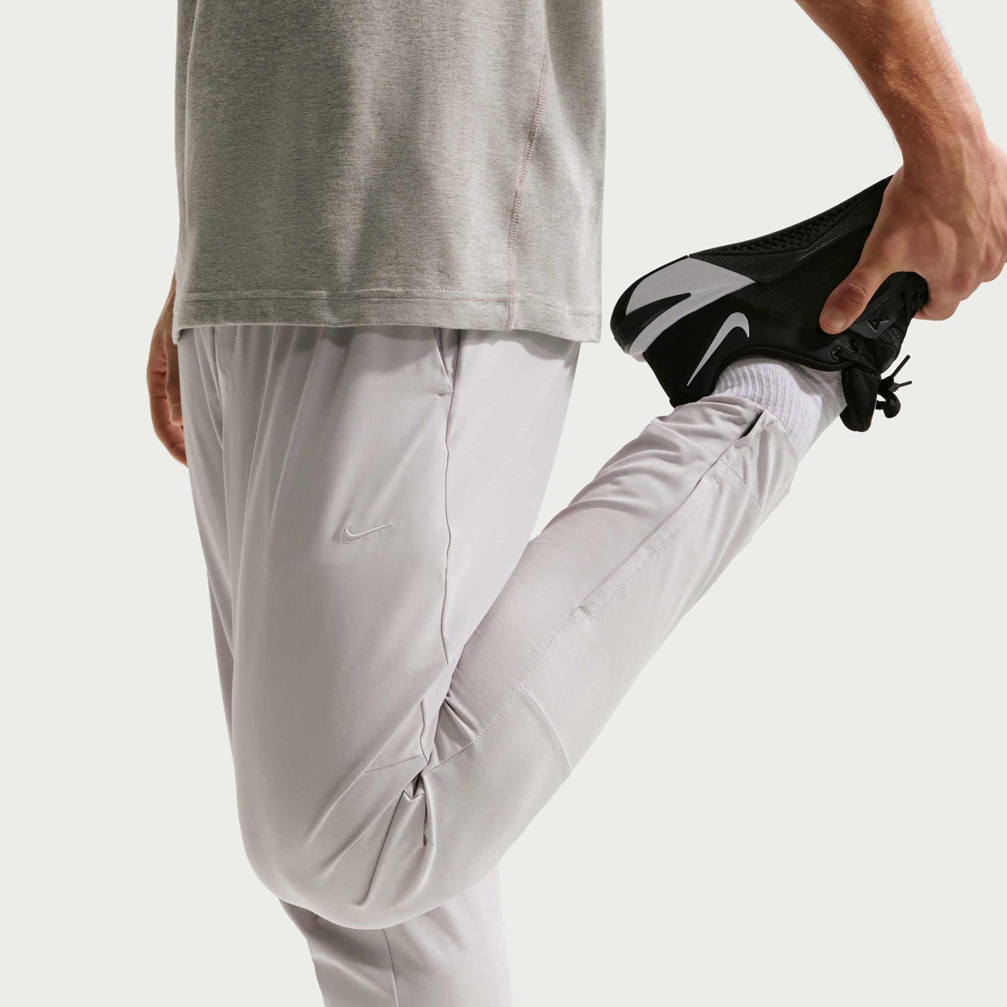 Штани Nike M DF UNLIMITED PANT TPR FB7548-097