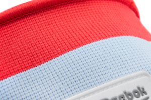 Фіксатор коліна Reebok Speedwick Knee Support білий, червоний Уні S RRSU-14323