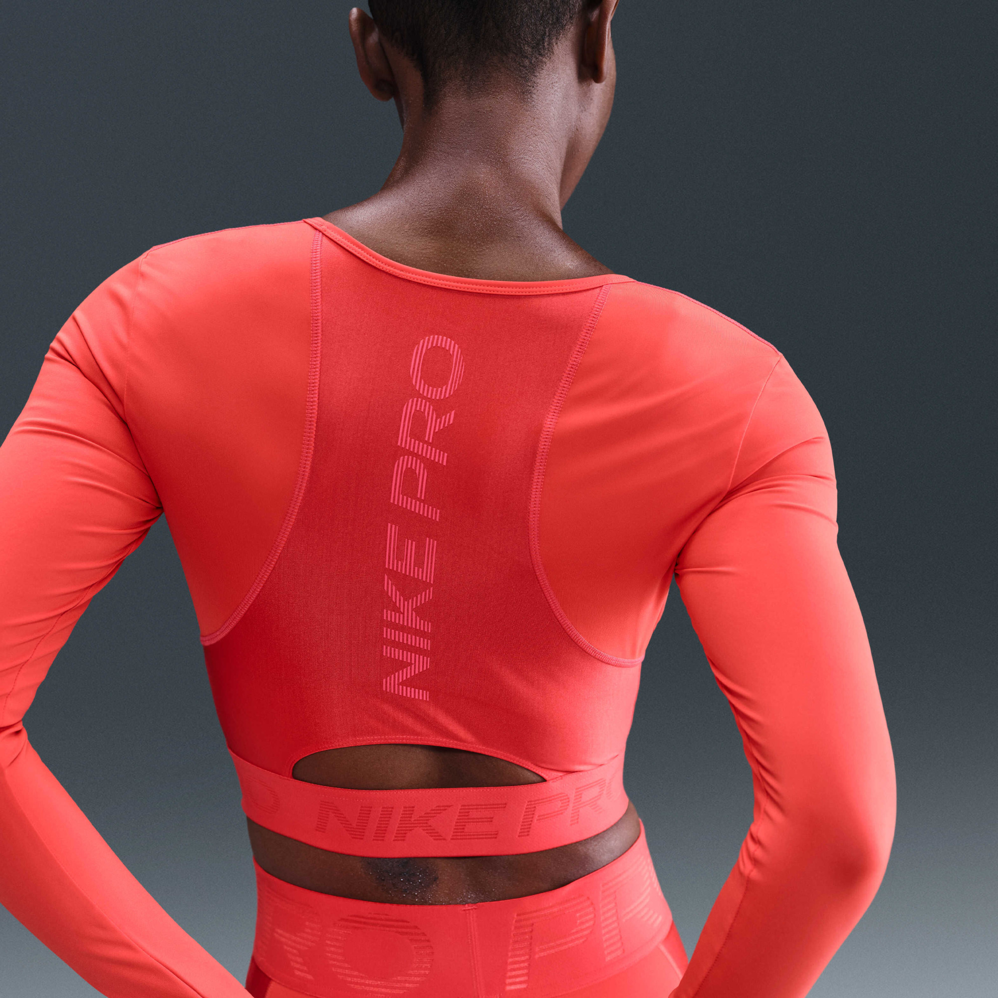 Лонгслів жіночий Nike Pro WomenS Dri- Fit Cropped Long- Sleeve Top Red HV9992-633