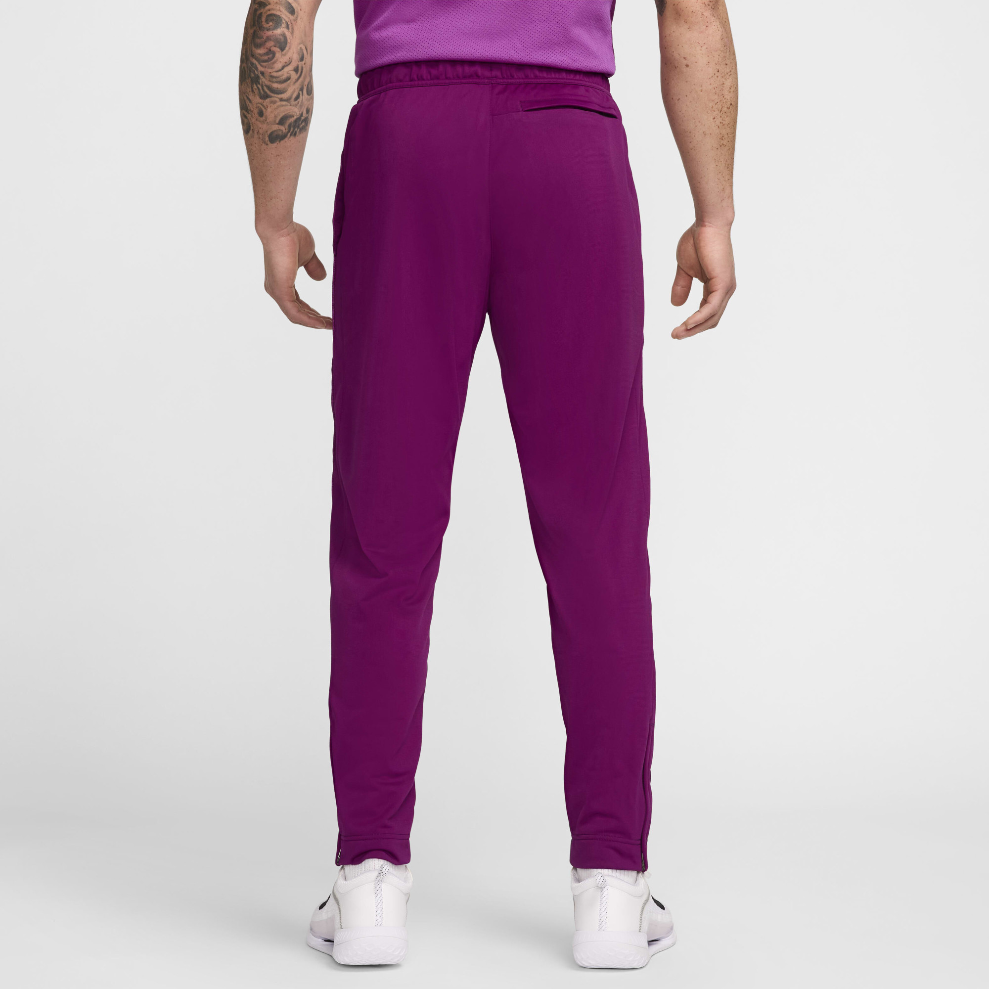 Штани чоловічі Nike Court Violet DC0621-610