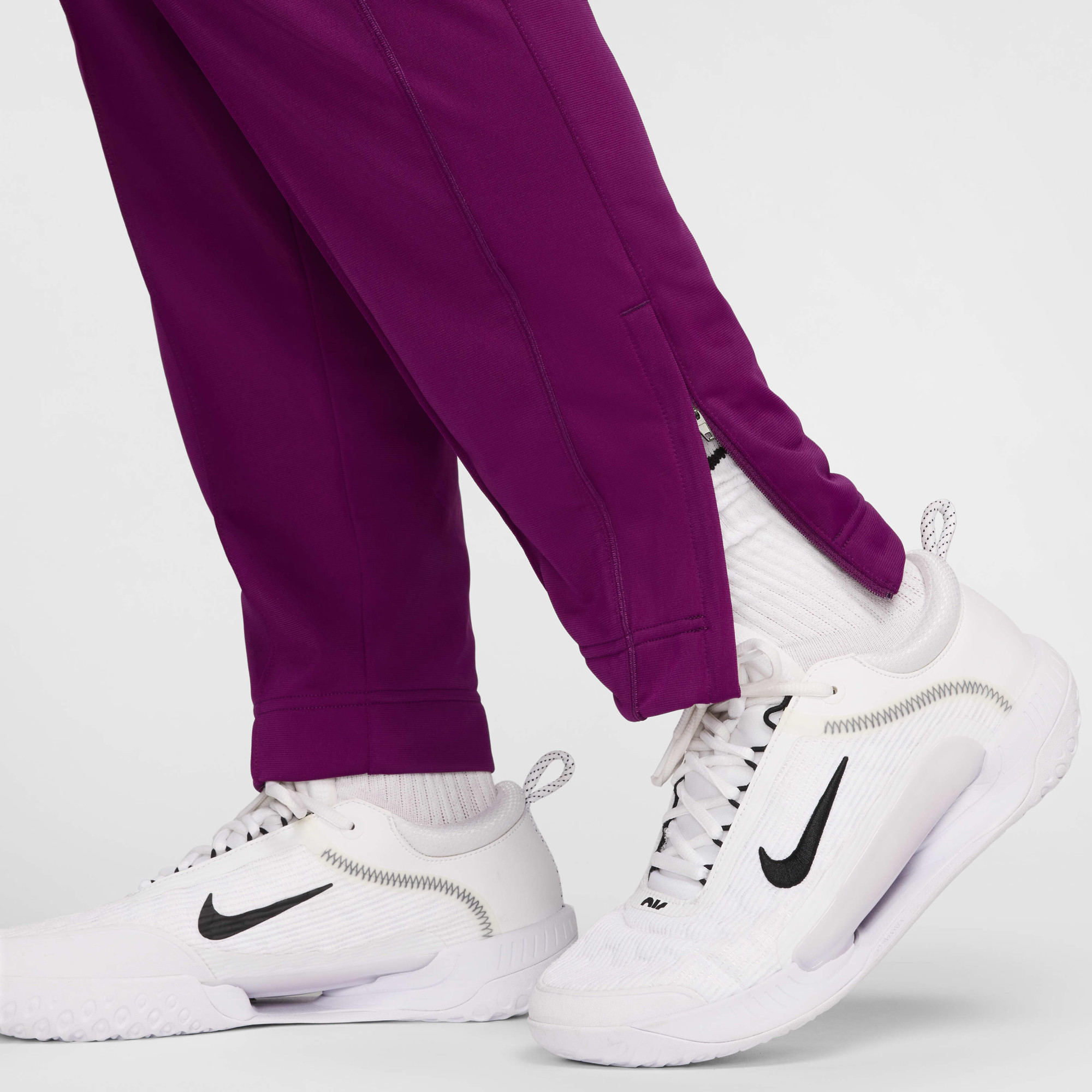 Штани чоловічі Nike Court Violet DC0621-610