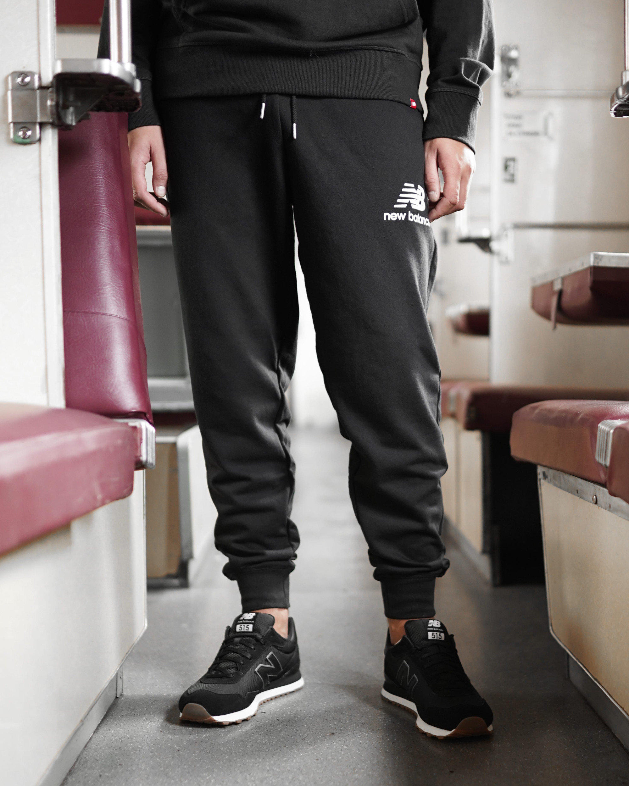 Брюки New Balance NB Ess Stacked Logo, шт MP03558BK