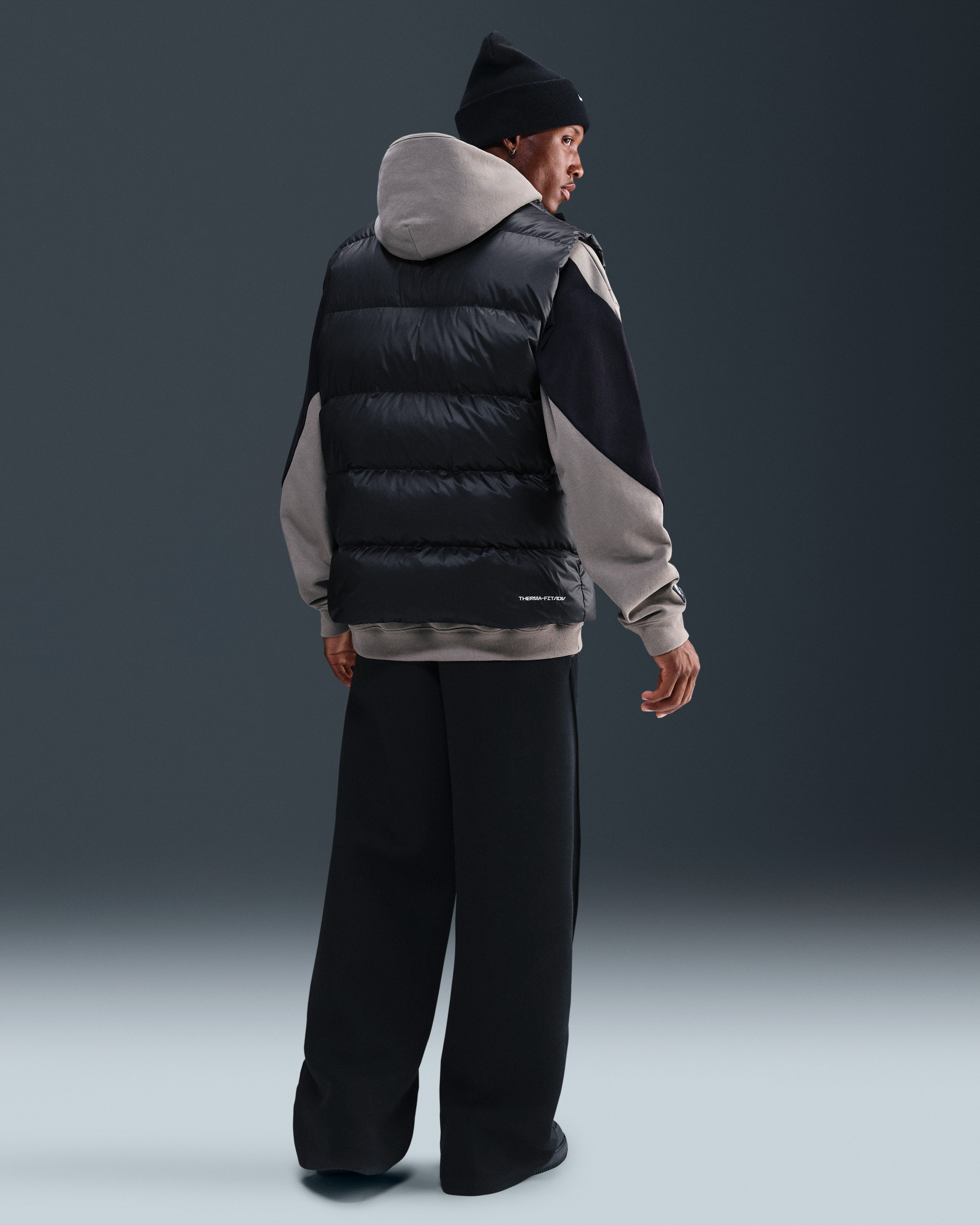 Жилетка Nike M WINDRUNNER STMNT VEST DWN HV1480-010
