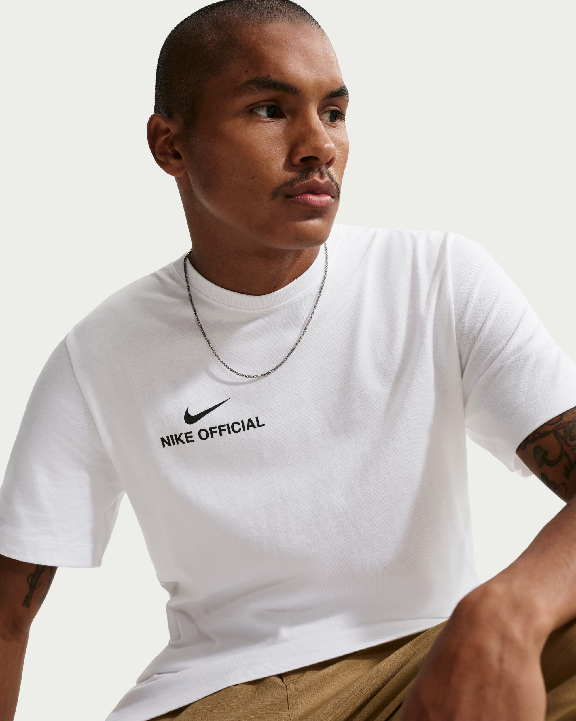 Футболка Nike U NSW TEE STD NIKE OFFICIAL IH1143-100