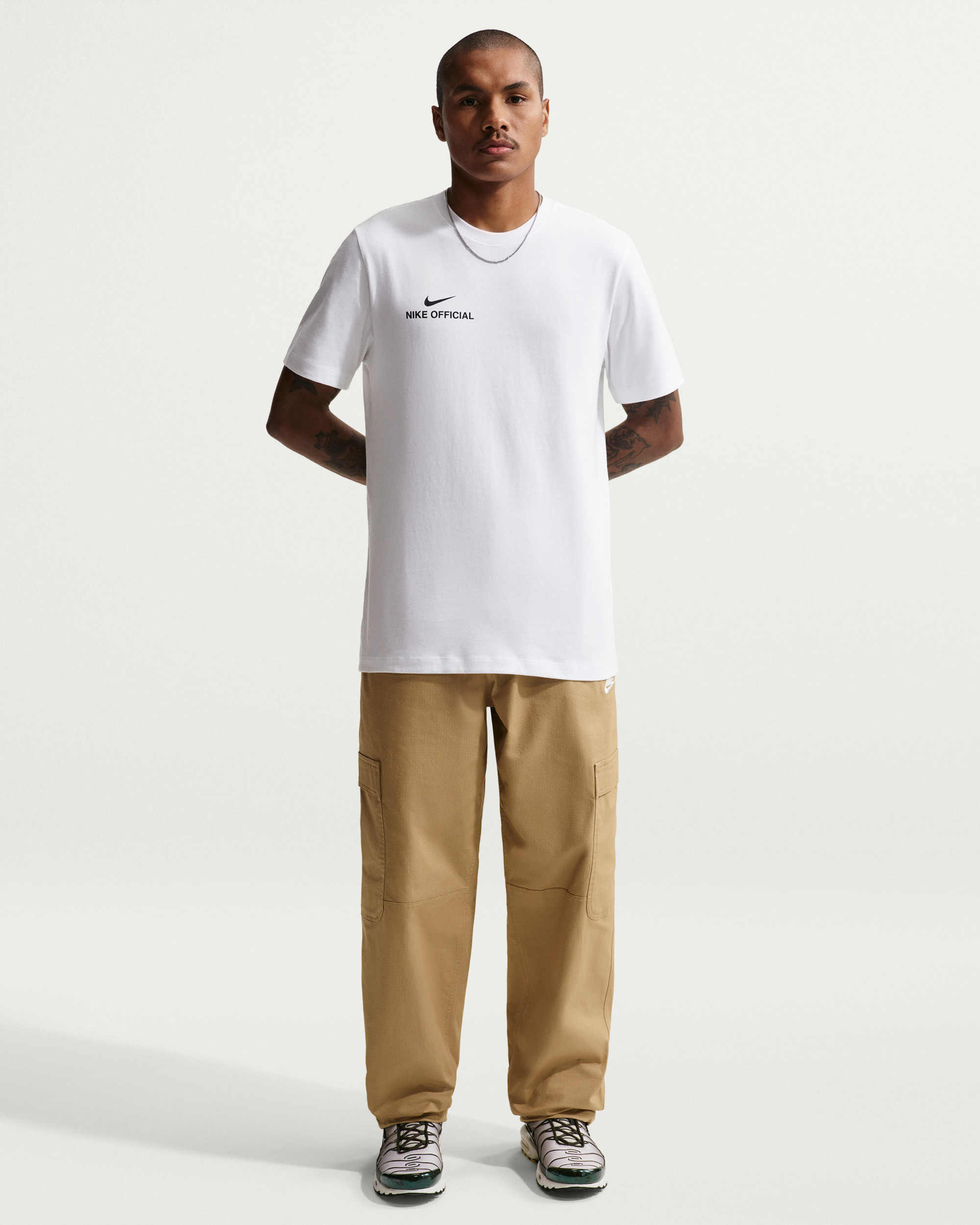 Футболка Nike U NSW TEE STD NIKE OFFICIAL IH1143-100