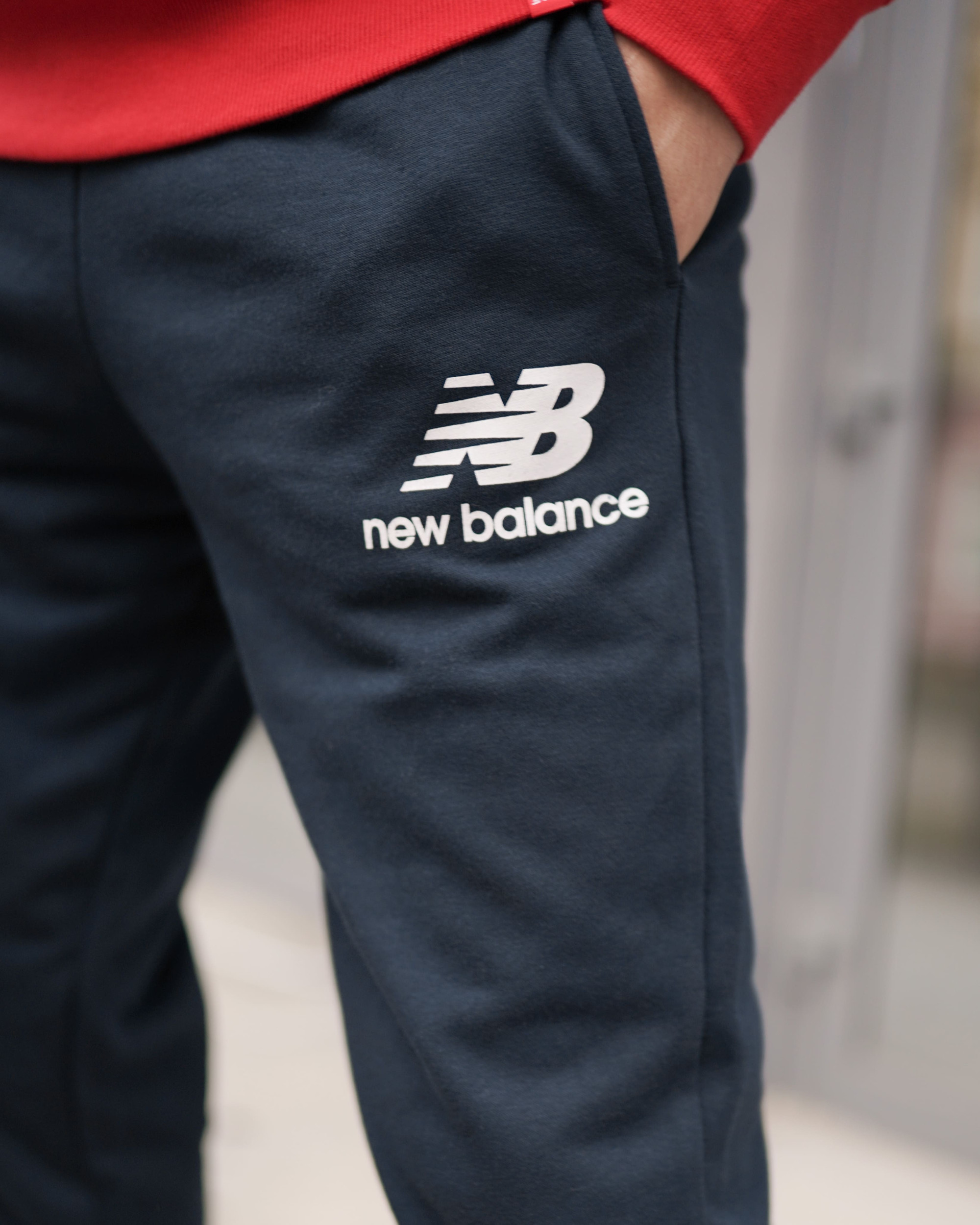 Брюки New Balance NB Ess Stacked Logo MP03558ECL