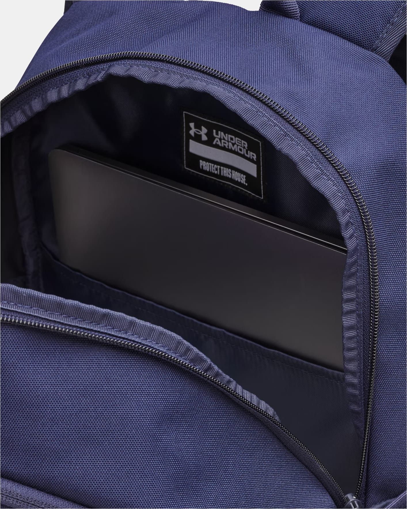 Рюкзак Under Armour Hustle Lite Backpack 26,5L темно-синій 31 х 47 х 17 см (6000399-410) 6000399-410