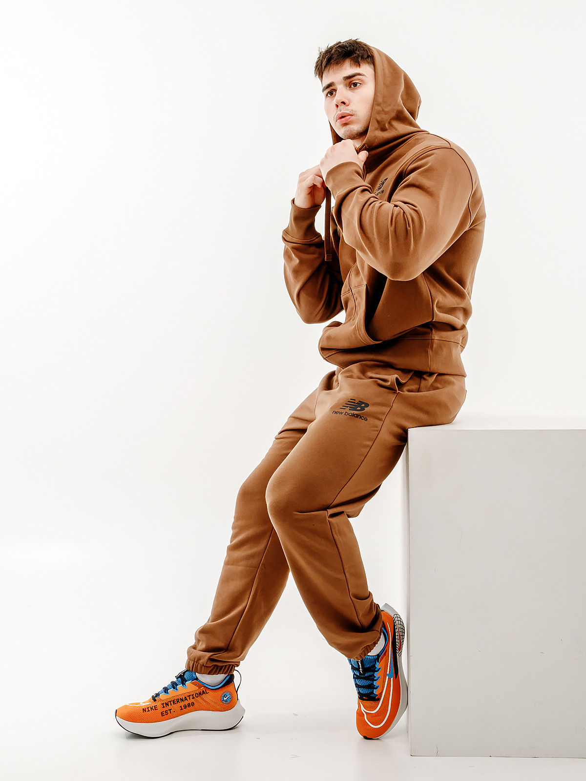Штани New Balance Essentials Stacked Logo MP31539DHE