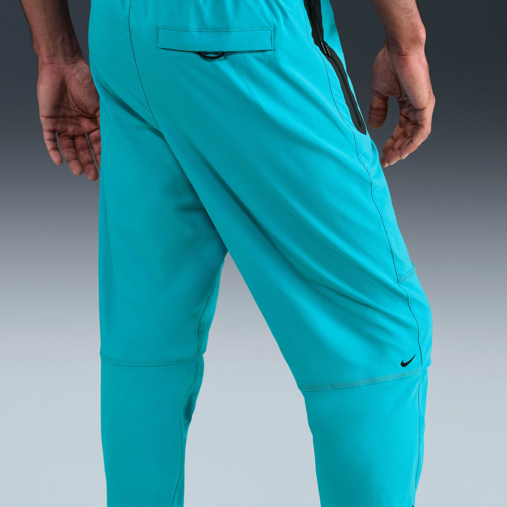 Штани чоловічі Nike Tech Wvn Oh Turquoise HM8241-345