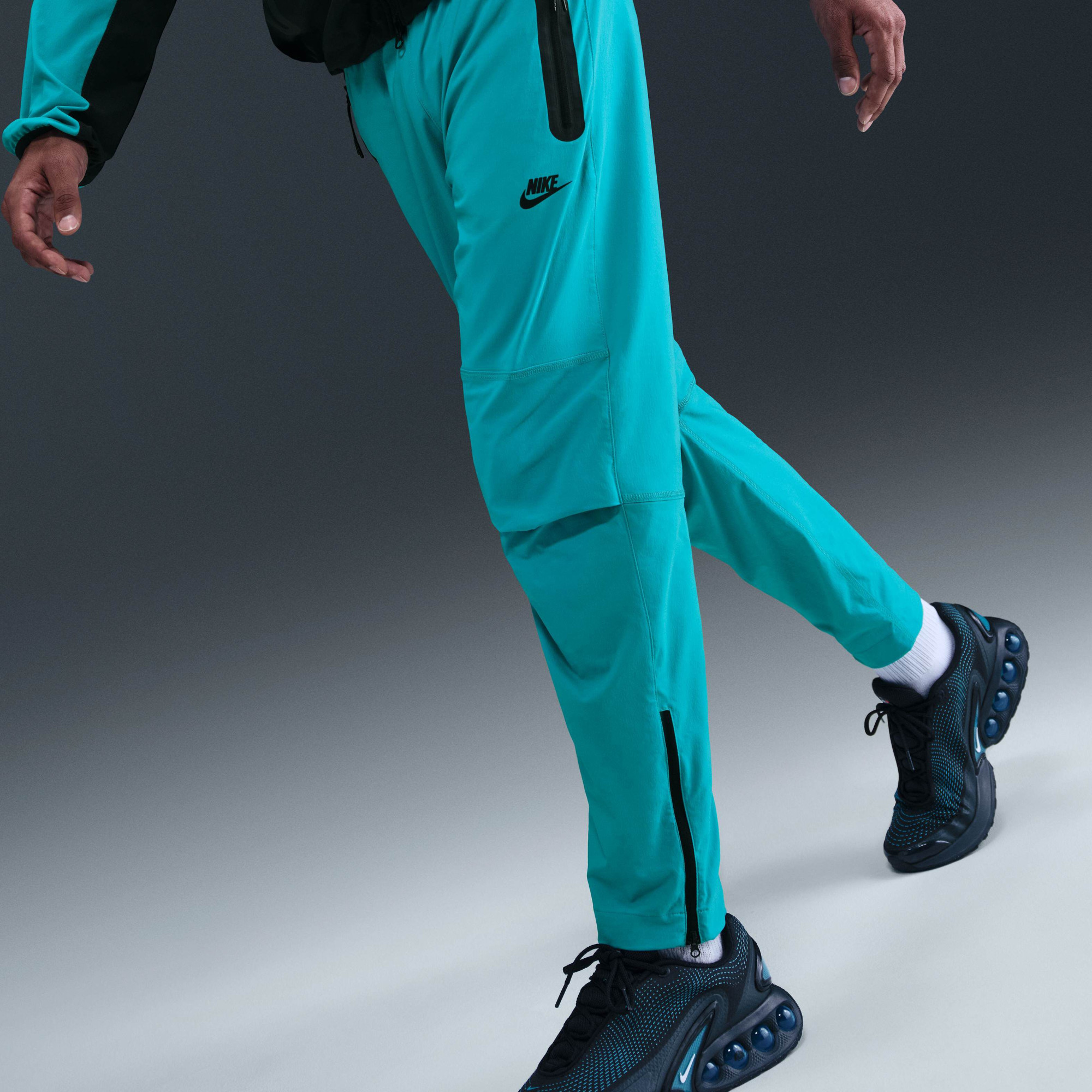 Штани чоловічі Nike Tech Wvn Oh Turquoise HM8241-345