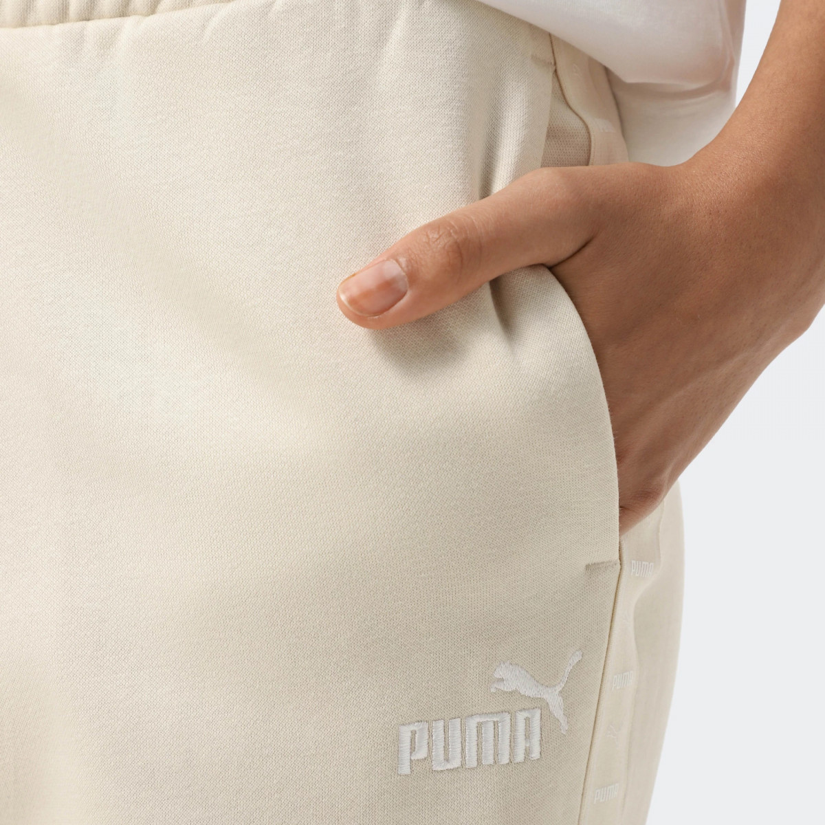 Штани спортивні ESS TAPE Sweatpants 68809887 Puma XS Бежевий 68809887