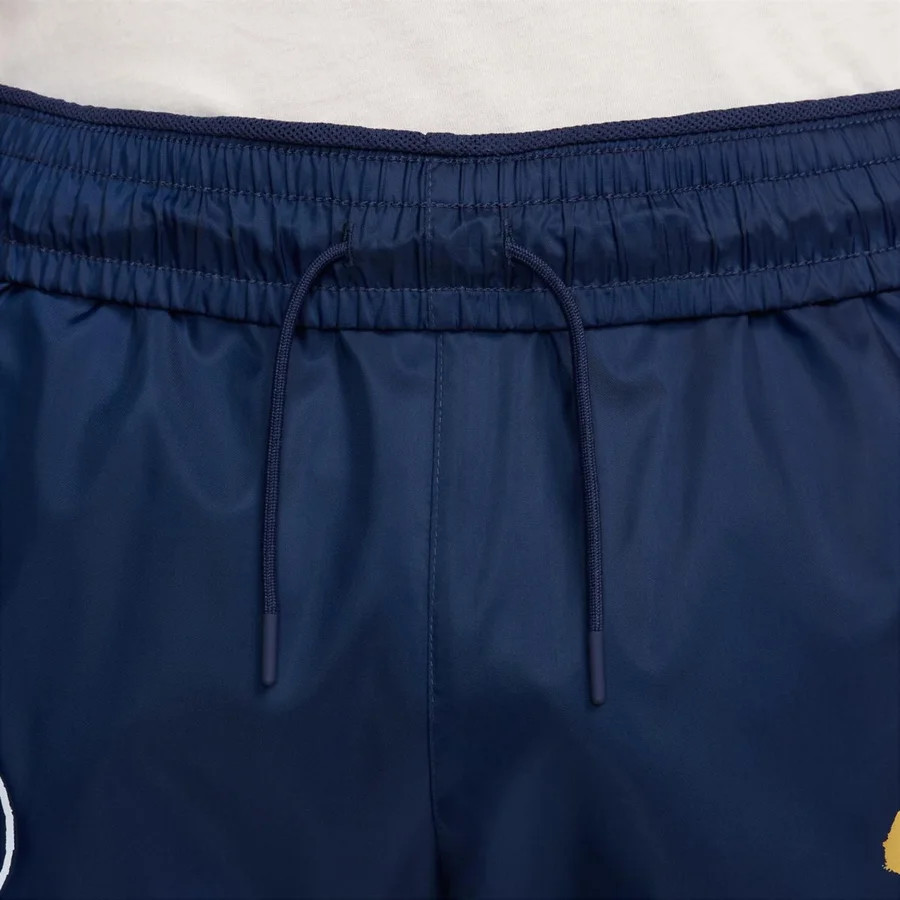 Штани чоловічі Nike Paris Saint-Germain Windrunner Blue FQ3412-410