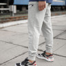 Брюки New Balance NB CLASSIC CORE FT MP03901AG