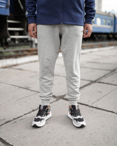 Брюки New Balance NB CLASSIC CORE FT MP03901AG