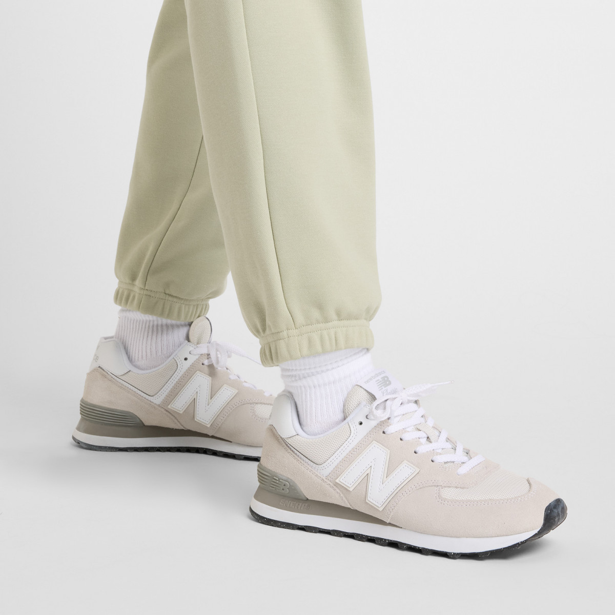 Штани спортивні Sport Essentials FT WP41500OVN New Balance L Бежевий WP41500OVN