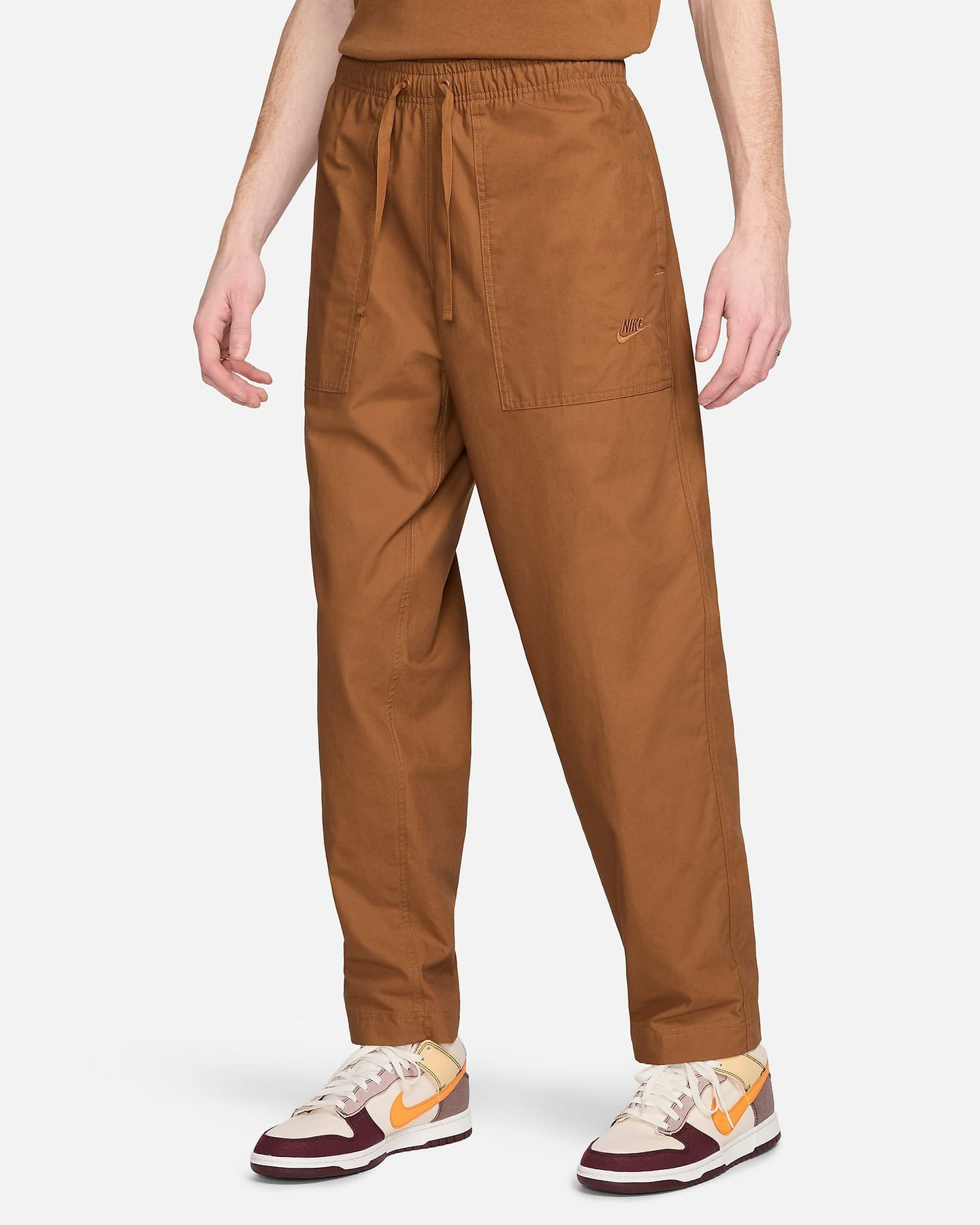 Штани чоловічі Nike Club Woven Pants Brown FN3096-281