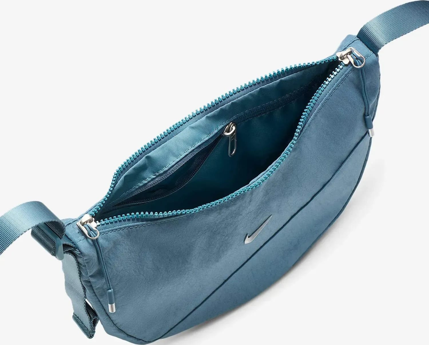 Сумка Nike NK AURA CRESCENT CROSSBODY 4L синій Жін 30 х 18 х 10 см (HQ4370-006) HQ4370-006