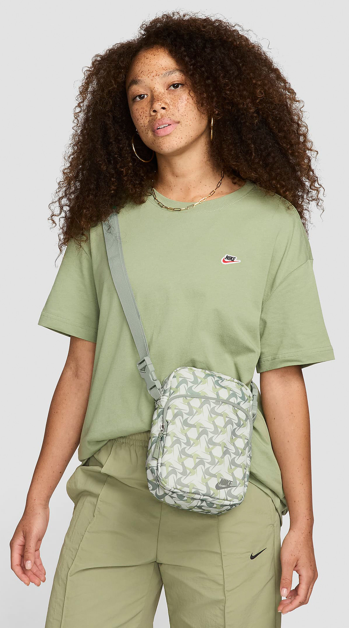 Сумка на плече Nike NK HERTGE CRSSBY-ACC PRNT FA24 4L сірий Уні 23x15x7,5 см FZ2526-121