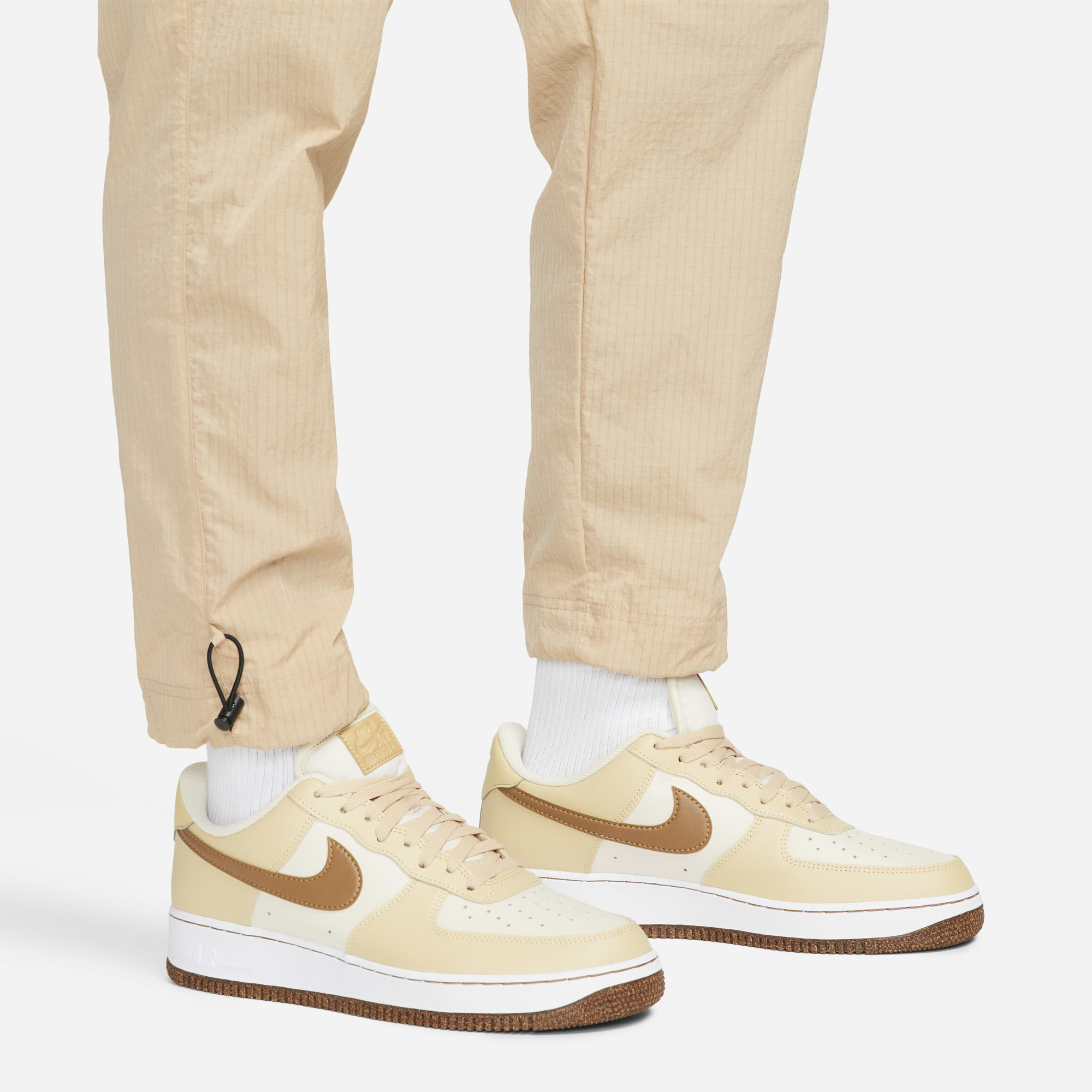 Штани чоловічі Nike Sportswear Repeat Beige FJ5260-200