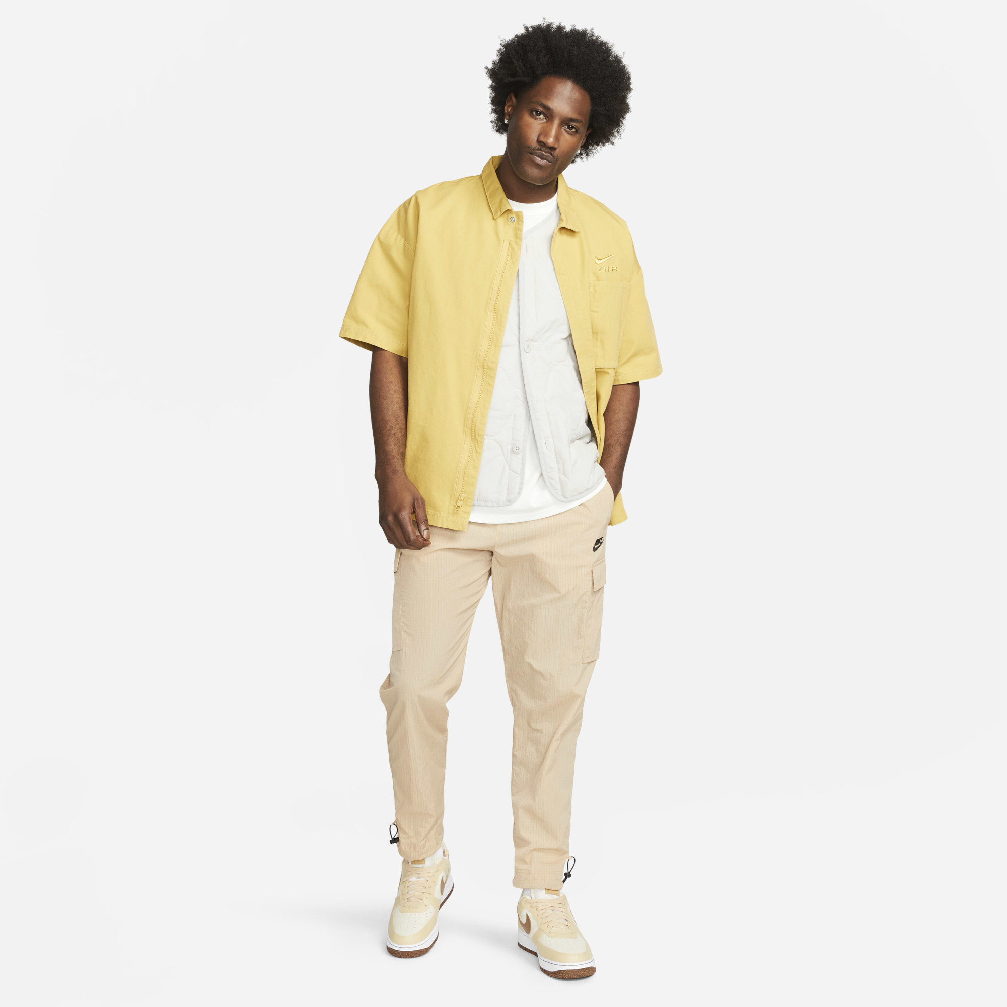 Штани чоловічі Nike Sportswear Repeat Beige FJ5260-200