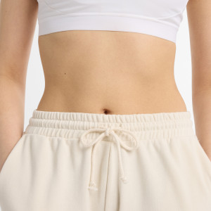 Штани жіночі New Balance Coastal Fleece Beige WP51503LIN L WP51503LIN